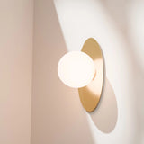 Calibo Crest Opal Glass 140mm Orb Wall Light Oval Plate 300mm | Brass - Dubbo Lighting Centre