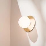 Calibo Crest Opal Glass 140mm Orb Wall Light Round Plate 200mm | Brass - Dubbo Lighting Centre